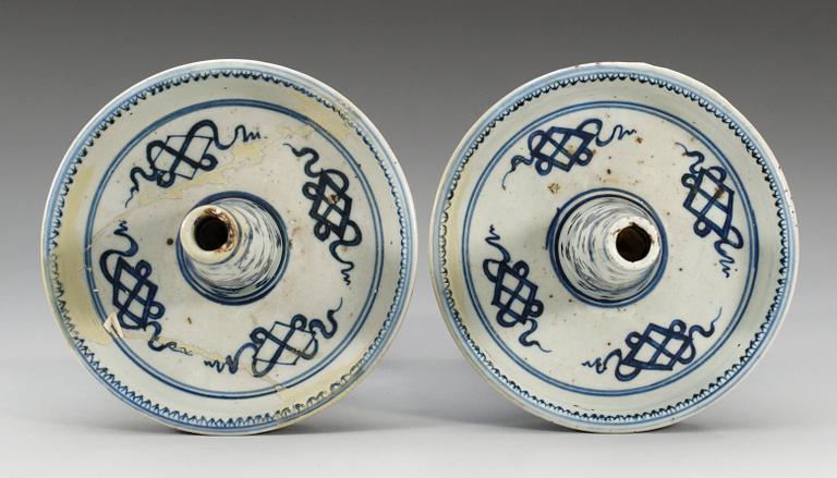 A pair of blue and white candlesticks, Qing dynasty, 18th Century. (2).