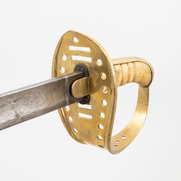 Two Swedish cavalry swords 1867 pattern, one with scabbard.