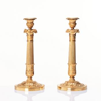 A pair of French Empire candlesticks, first part of the 19th century.