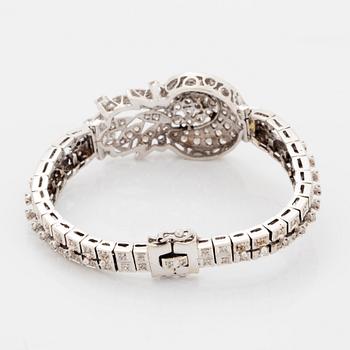 White gold and brilliant-cut diamond bracelet.