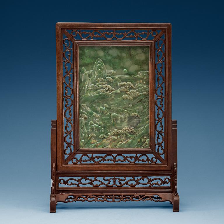 A Chinese reticulated wood table screen.