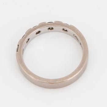 A brilliant-cut diamond ring.