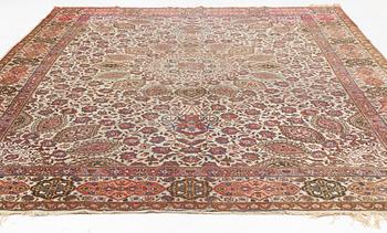 A Tabriz carpet, c. 390 x 305 cm.