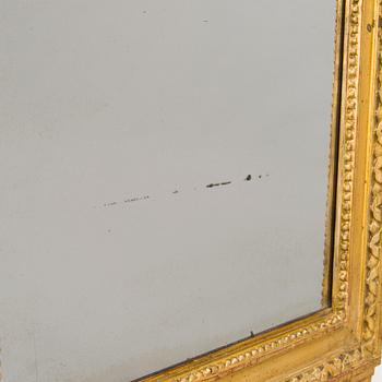 A mirror by Fredric Johan Foeder or Fjäder, (Master in Turku 1782-1832). Signed F.J.F and hallmarked in Turku.