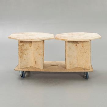 A pair of travertine side tables later part of the 20th century.