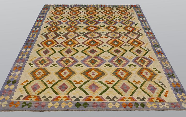 A carpet, kilim, ca 293 x 198 cm.