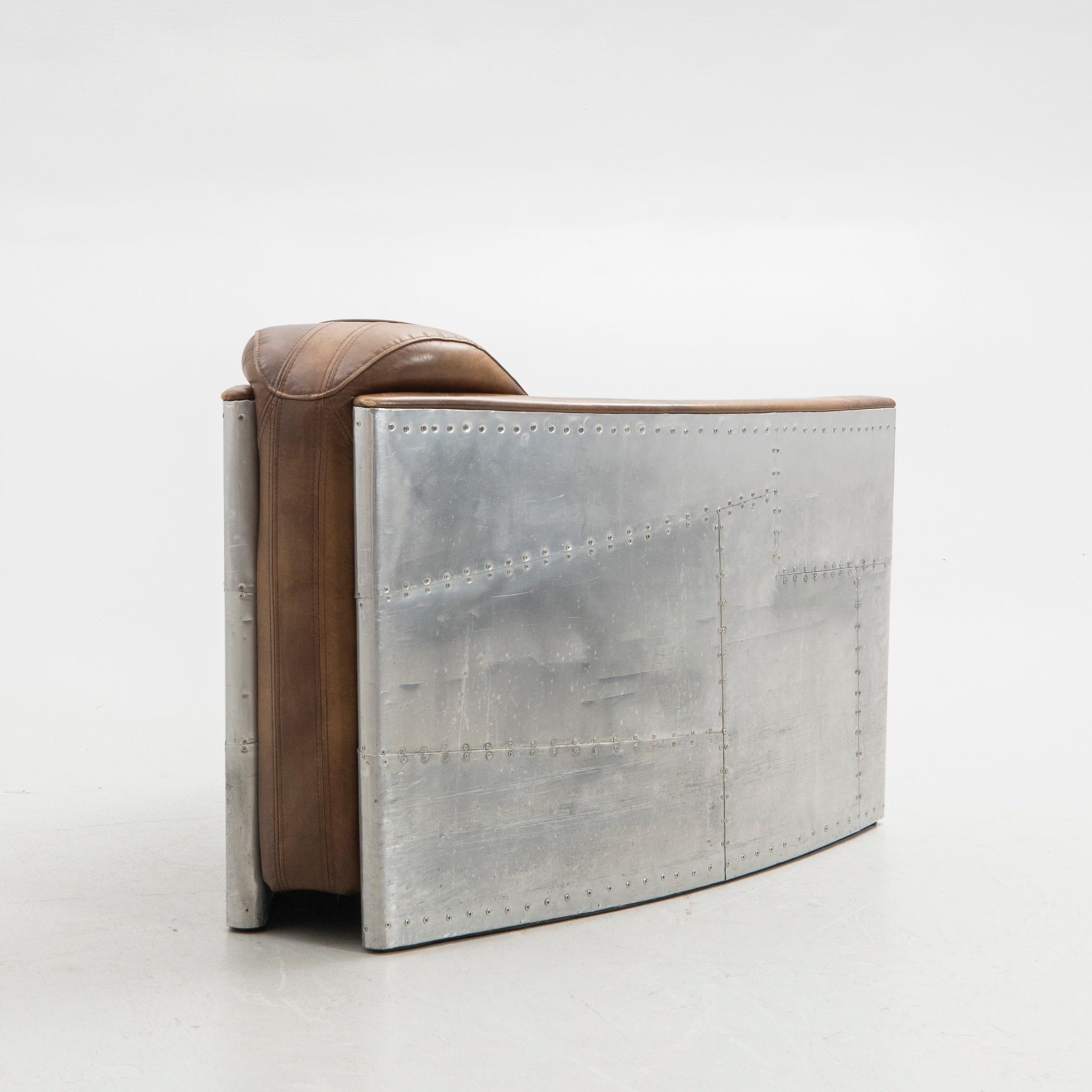 Timothy Oulton, armchair, "Tomcat", Artwood, 21st century.