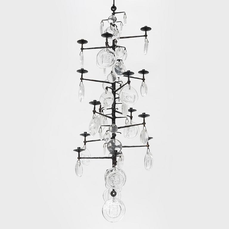 Erik Höglund, a 16 light chandelier for Boda Smide, Sweden.