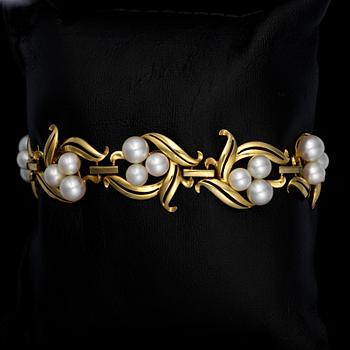 ARMBAND, 14K guld, pärlor. Vikt ca 22,1 g.