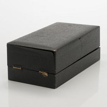 A 12-piece set of silver glass coasters, Kultakeskus, Hämeenlinna 1952. In original fitted case.