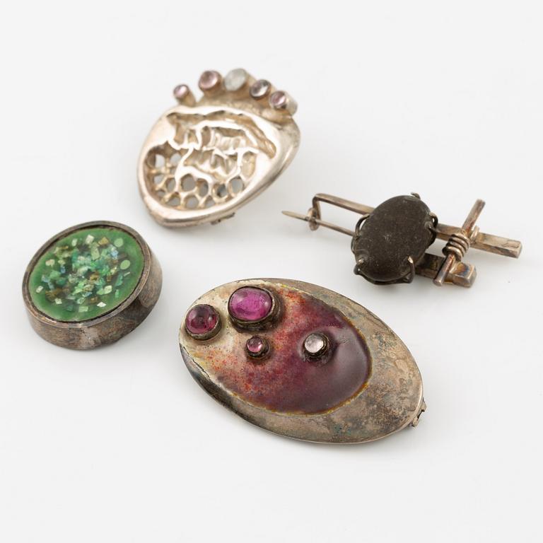 Lars Arby, four brooches, sterling silver and enamel stones, Gothenburg 1963, 1964 and 1971.