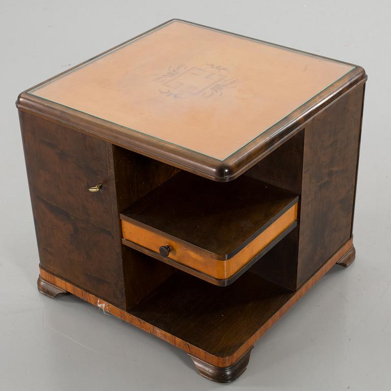 A 1940's smoking table.