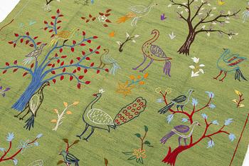 A hand-embroidered Kilim rug, c. 200 x 150 cm.