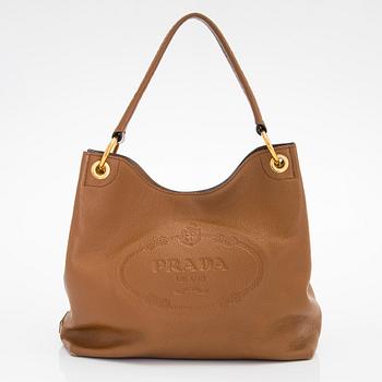 Prada, a "Vitello Phenix" leather bag.