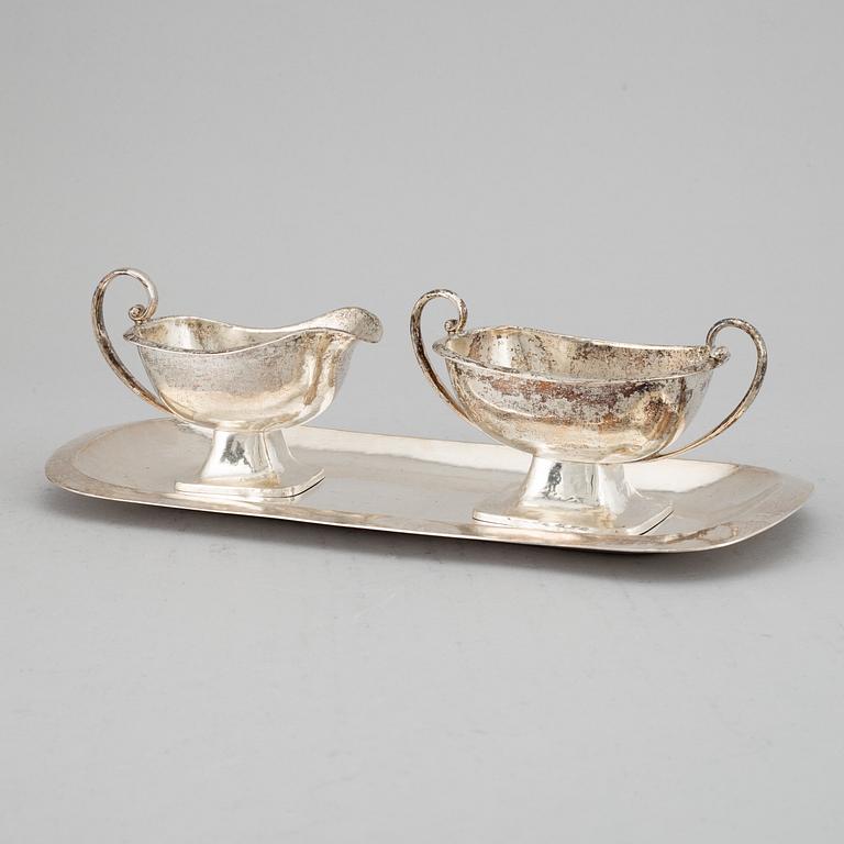 A German 20th century silver 800/1000, sugar and cream-jug on tray, marked Julius Herz.