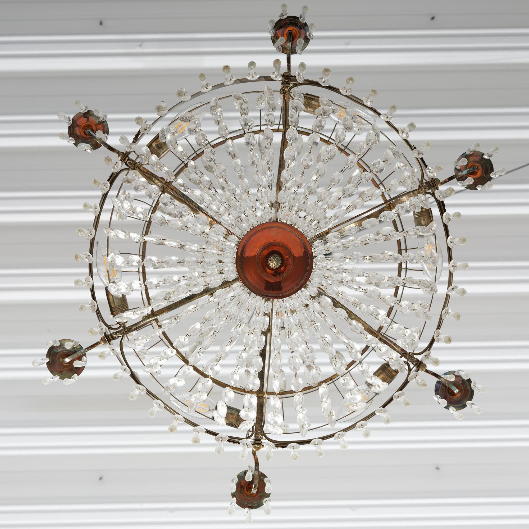 An Empire gilt brass and cut glass seven-light chandelier, Sweden, early 19th century.
