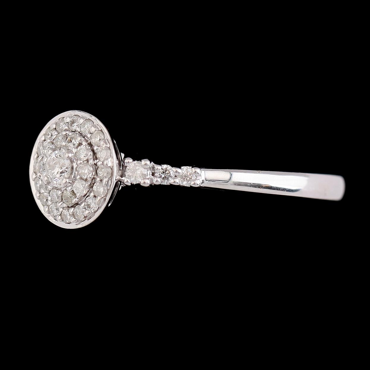 RING, 14K vitguld, briljantslipade diamanter tot ca 0.28 ct. Vikt ca 3 g.