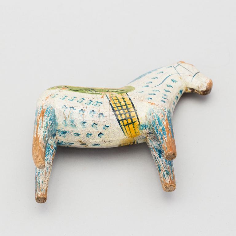 A painted folk art dala horse first half of the 20th century.