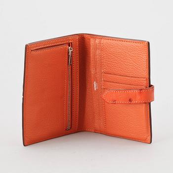 A wallet by Hermès.