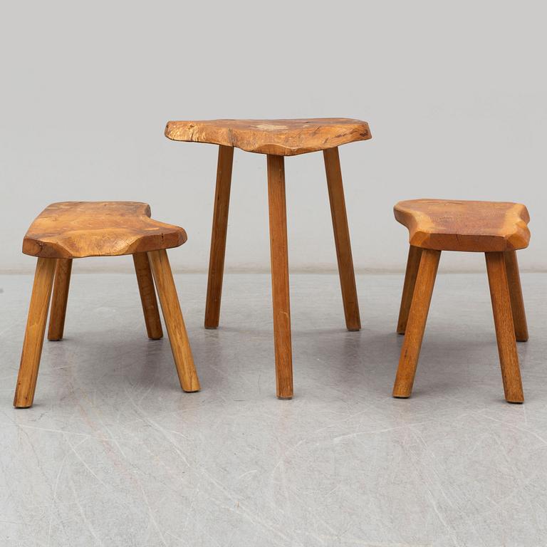 an oak table with two stools, second half of the 20th century.