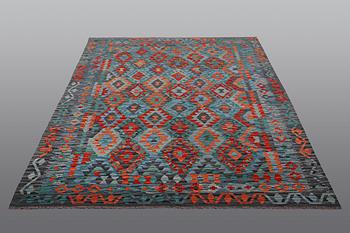 A rug, kilim, ca 252 x 179 cm.