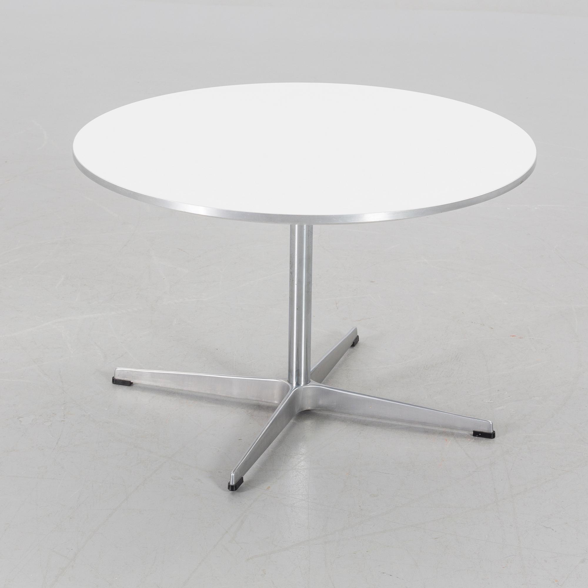 A COFFEE TABLE BY PIET HEIN AND BRUNO MATHSSON FOR FRITZ HANSEN 1985.