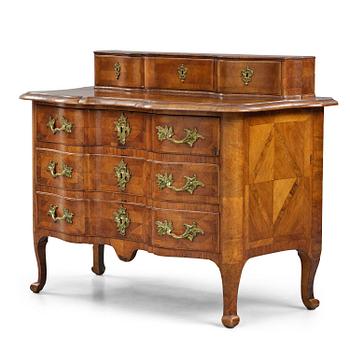 3. A late baroque walnut parquetry commode by C. Linning (master in Stockholm 1744-79).