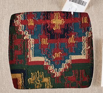 A BENCH CUSHION probably, A FRAGMENT, double-interlocked tapestry, ca 58,5-59,5 x 220-223 cm, Scania (Sweden).