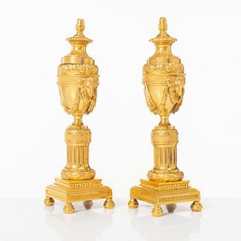 A pair of French Louis XVI style gilt-bronze casolettes, later part 18th century.