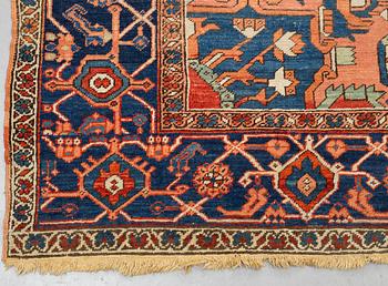 A carpet, an antique Heriz, ca 469,5-471 x 300-309,5 cm.