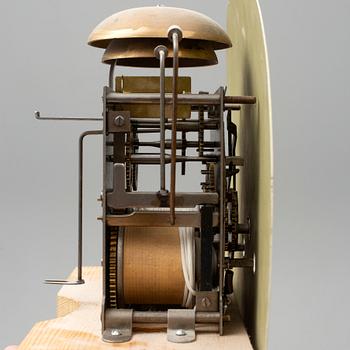 A combined clock and chest of drawers from late 19th  century.