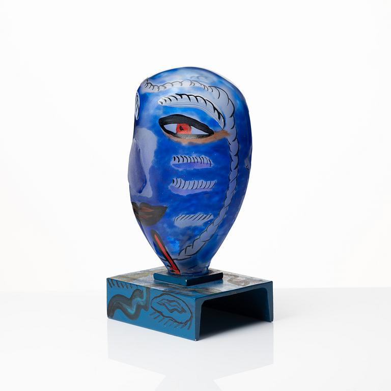 Ulrica Hydman-Vallien, a painted glass and iron sculpture of a face, Sweden.