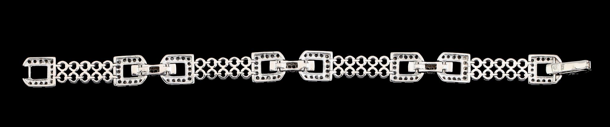 ARMBAND, sterlingsilver, ametister och topaser, art déco-stil.