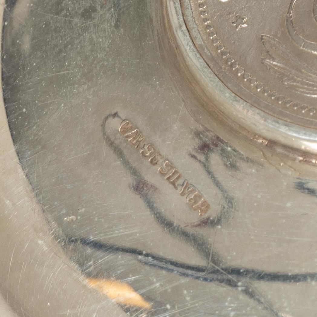 12 silver ashtrays with inlaid coins, silver, Pakistan, mid 20th century.