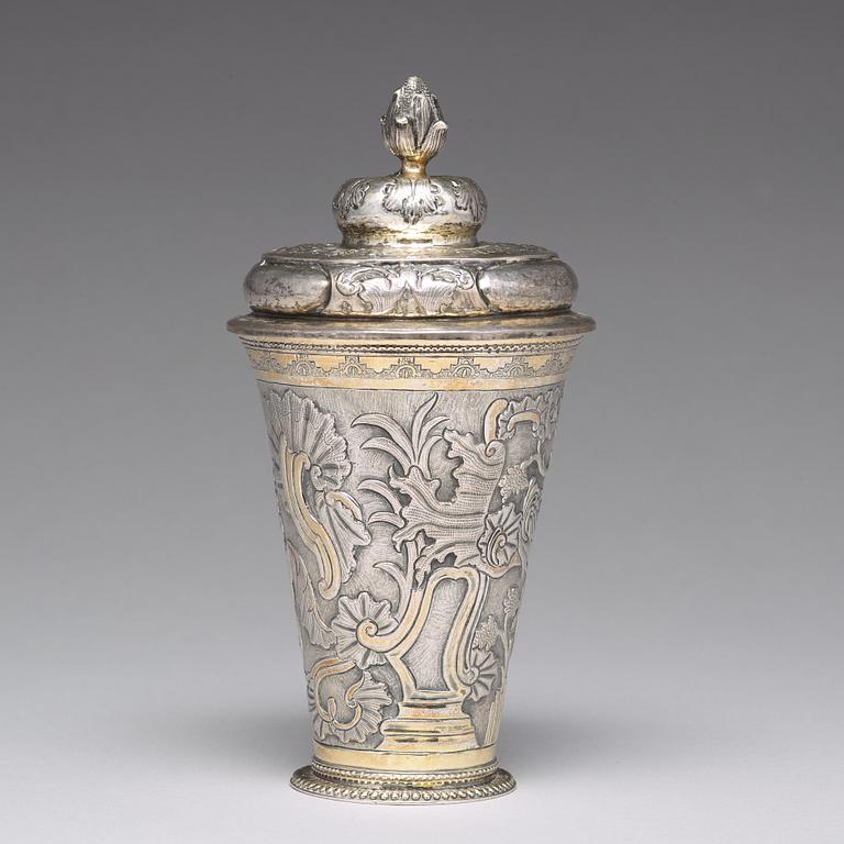 A Russian 18th century parcel-gilt silver beaker and cover, mark of Grigorij Poltow, Moscow (1755-1768).