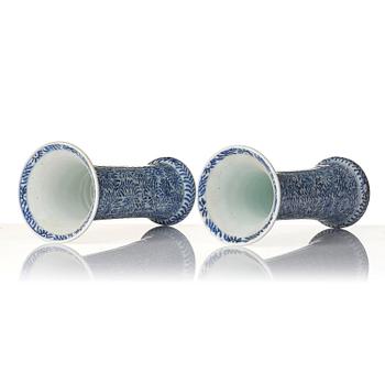 A pair of blue and white 'floral' vases, Qing dynasty, Kangxi (1662-1722).