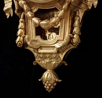 A Louis XVI late 18th century gilt bronze wall-clock by A. Carcel le Jeune.