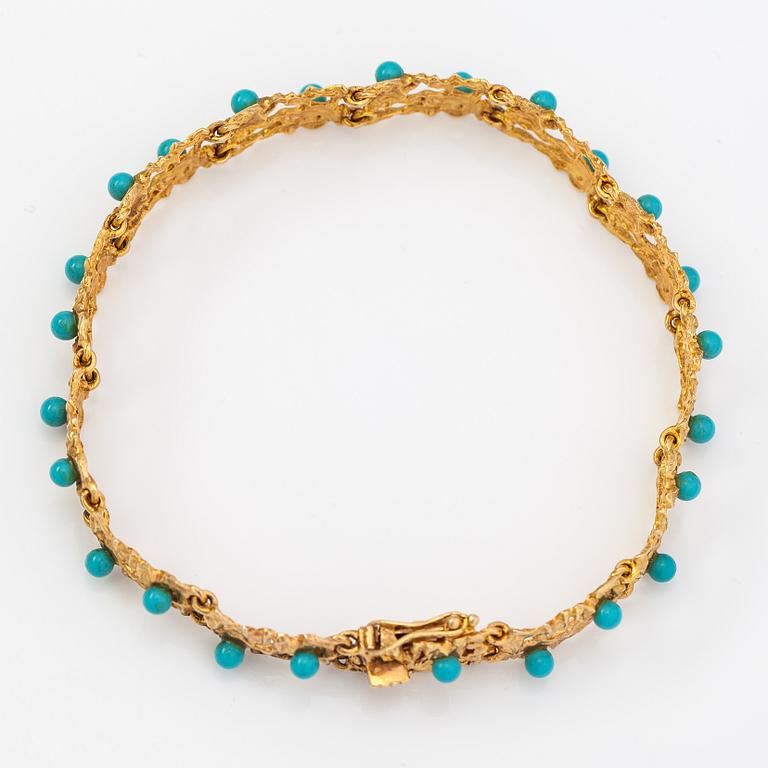 A 14K gold braclelet with turquoise imitation. H.Lahtinen&Co, Helsinki 1970.