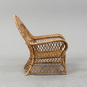 ARMCHAIR, rattan, mid 20 th century.