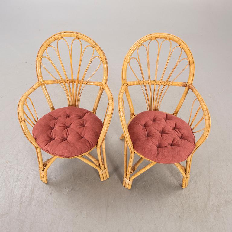 A pair of bamboo and rattan 1960/70s armchairs.