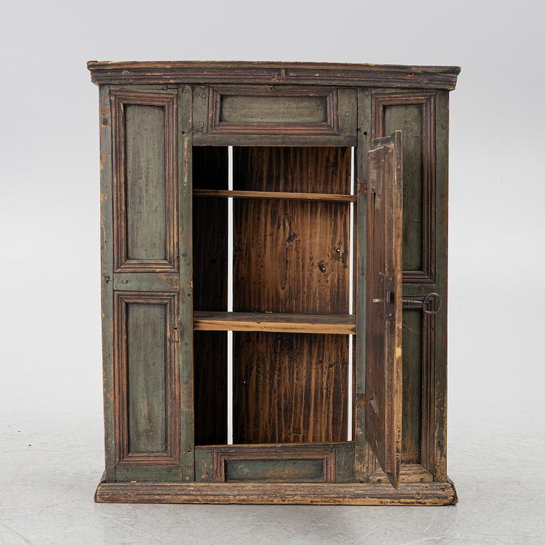 A wall-hanged cabinet, Sweden, dated 1796.