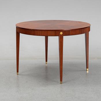 A gustavian style mahogany dining table from the mid 20th century.