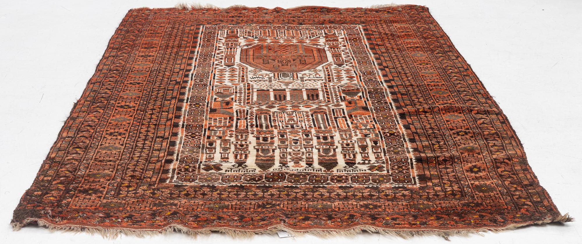 An antique Bechir rug, approx. 215 x 148 cm.