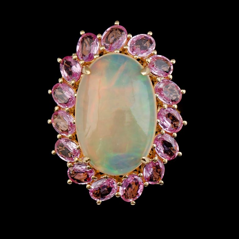 RING, 18K guld, opal och safirer.