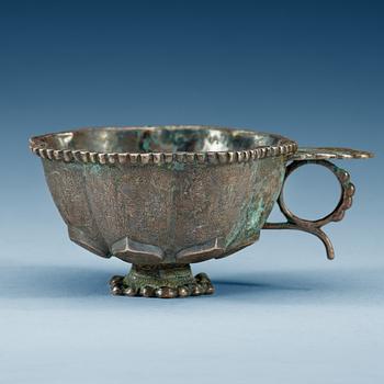 1841. A petal shaped silver cup, presumably Tang dynasty.