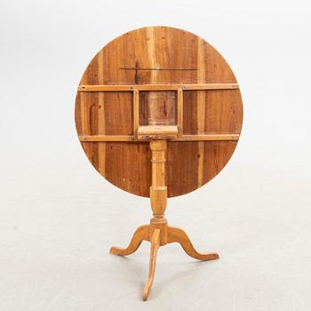 Folding table, 19th century, three-part base.