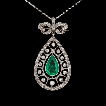 1069. A drop shaped emerald and old-cut diamond, circa 1.20 cts, pendant and brooch, with chain.