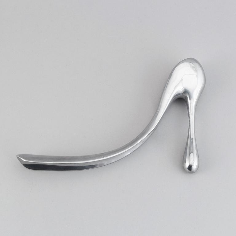 A metal shoe horn by Manolo Blahnik, 2000s.