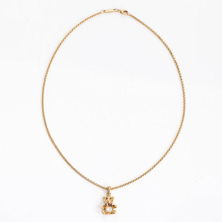 Chopard, an 18K gold 'Happy Diamonds Teddy Bear' pendant necklace.