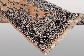 A carpet, Kerman, ca 352 x 188 cm.